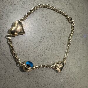14k Gold and Blue Heart Charm Bracelet with Central Stone